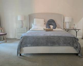 king bed - upholstered headboard and bed surround frame, mattress and box springs, pair of neutral colored ceramic lamps