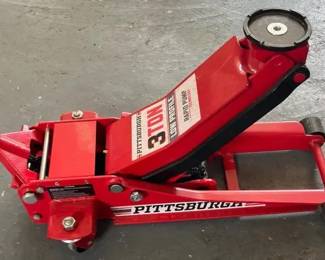 Pittsburgh 3 Ton Low Profile Floor Jack Pittsburgh Automotive 3 Ton Low Profile Floor Jack featuring Rapid Pump technology for quicker lifting. Great for automotive, garage & shop use. Low profile design helps fit under lower clearance vehicles.  Shows light use/storage wear from workshop environment. See photos for condition, decals & overall style. Heavy-duty steel construction with long handle for leverage & maneuverability. 