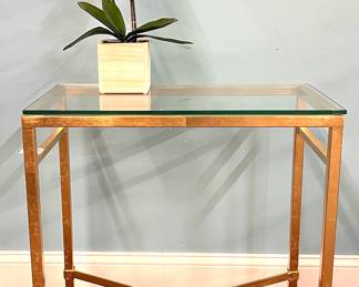 Contemporary metal and glass stand