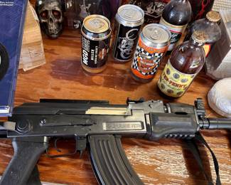 airsoft gun; Harley Davidson, beer cans