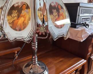 Touch lamp with native American pictures on it