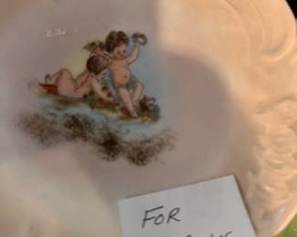 Vintage hand painted cherub plates