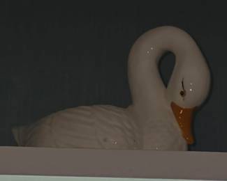 I will get better picture but to give you an idea - Ceremic Swan Figurine 