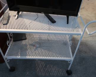 two level white metal cart 36" x 19" Price is 65.00