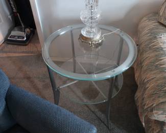 Round two level glass table Price IS 65.00
