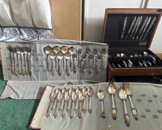 Silver and silverplated silverware sets