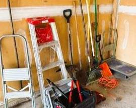 Comprehensive Garage Tool and Ladder Set with Various Gardening and Utility Tools