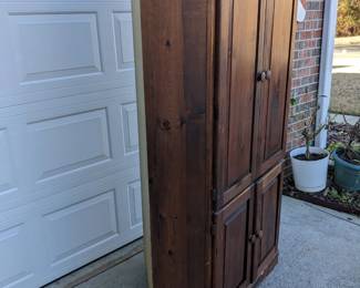Side view of Corner Storage entertainment unit $100