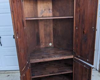 Open inside view of corner entertainment or storage unit $100
