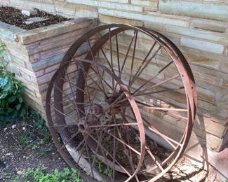 Three antique wagon wheels