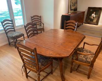 Drop leaf dining room table can be square or oval with six ladder back cane chairs.  46” x 46” or 65” x 65” with leaves