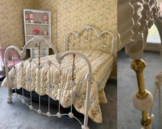 white iron bed frame, elegant arched silhouette and distinctive brass finials