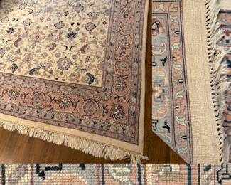 ivory, hand-knotted Persian Tabriz or Turkish Oushak style rug, featuring a prominent pastel peach border and a detailed floral Medallion Center