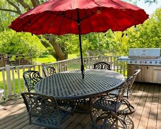 Cast Aluminum Table + 6 Rocker Chairs and Umbrella