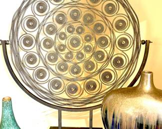 Metal sculpture on stand