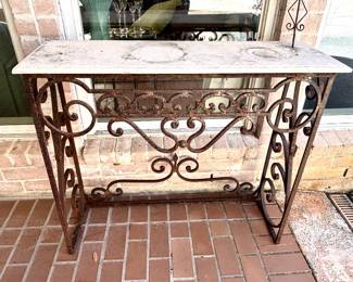 Rustic iron base table with stone top