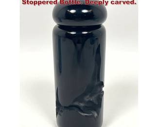 Lot 37 Deeble Carved art Glass Perfume Stoppered Bottle. Deeply carved.