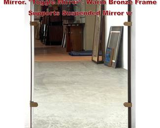 Lot 20 UTTERMOST Designer Metal Wall Mirror. Toggle Mirror. Warm Bronze Frame Supports Suspended Mirror w