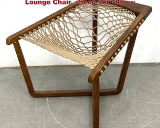 Lot 123 Mid Century Modern Hammock Lounge Chair. sheep skin throw