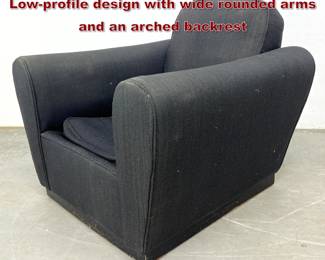 Lot 475 Art Deco Style Club Lounge Chair. Lowprofile design with wide rounded arms and an arched backrest