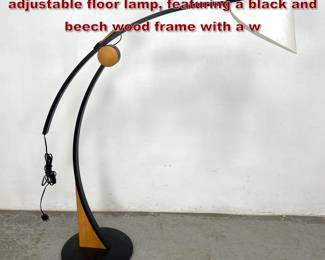 Lot 218 Mario Vivaldi for Domus Pollo adjustable floor lamp, featuring a black and beech wood frame with a w