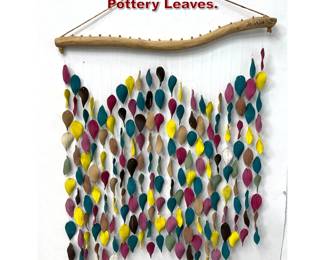 Lot 201 Artist Wall Hanging Sculpture. Pottery Leaves.
