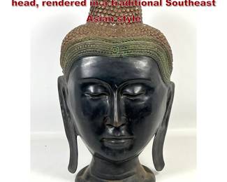 Lot 15 Cast bronze sculpture of a Buddha head, rendered in a traditional Southeast Asian style