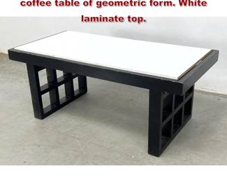 Lot 250 Mid Century Modern modernist coffee table of geometric form. White laminate top. 