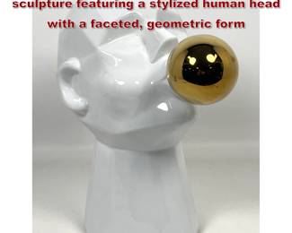 Lot 23 Contemporary glazed ceramic sculpture featuring a stylized human head with a faceted, geometric form
