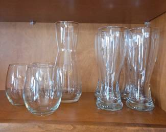 Lot # B58 - Clear Glassware Set with Stemless Wine Glasses, Carafe, and Pilsner Glasses