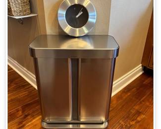 Lot # B84 - Simplehuman Stainless Steel Step Trash Can and Infinity Stainless Steel Wall Clock
