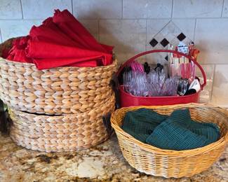 Lot # B70 - Natural Woven Baskets, 36 Red Fabric Napkins, Red Metal Utensil Caddy, & Bread Warming Set