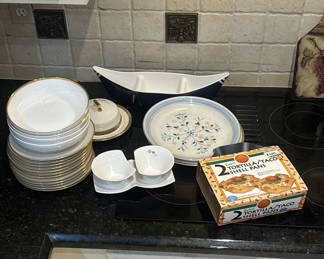 Lot 246: Assorted white ceramic dinnerware and tortilla shell pan set