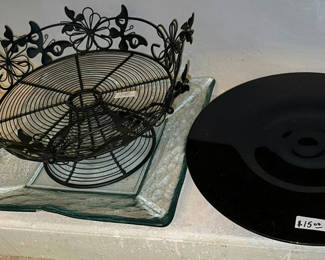 Lot 48: Black wire fruit basket with butterfly motif and round black glass plate