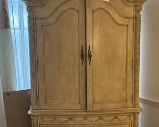 Lot 277: Ornate carved armoire with drawers and media shelf