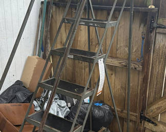 Lot 304: Metal rolling multi-step stair ladder