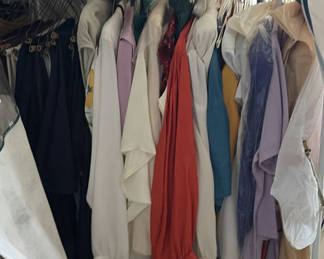 Lot 97: Portable wardrobe closet with hanging clothes
