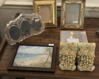 Lot 79: Assorted decorative frames, wall art, and sculptural accents
