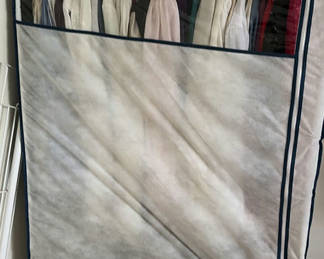 Lot 98: Fabric wardrobe with hanging clothes and hats