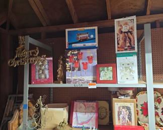 Lot 105: Assorted Christmas-themed decor and vintage photo albums