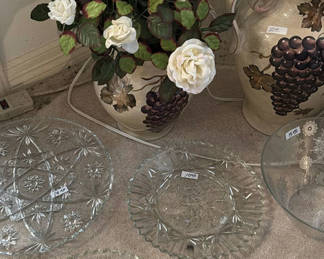 Lot 323: Grapevine-Decorated Ceramic Vases with White Roses and Etched Glassware
