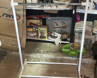 Lot 217: White metal clothing rack
