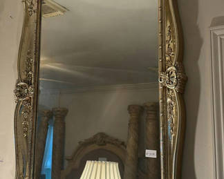 Lot 72: Pair of ornate gold-framed mirrors