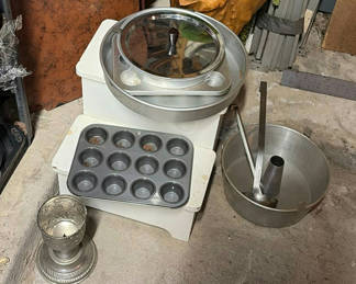 Lot 10: Assorted kitchenware, storage boxes, and decorative plant arrangement