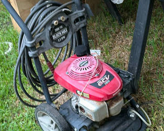 Lot 29: Red Black Max pressure washer with Honda engine and two red gasoline cans
