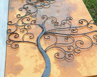 Lot 32: Wrought-iron tree sculpture on rusted metal sheet