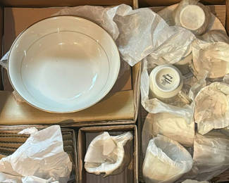 Lot 228: Ivory Elegance porcelain dinnerware set (bowls and mugs)