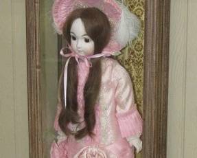 Porcelain Doll in Case