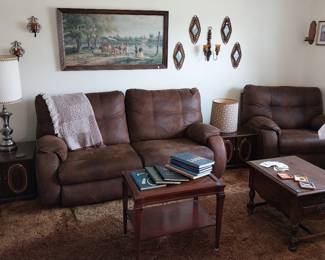 end tables, electric reclining brown suede couch and chair, table lamps, wall decor