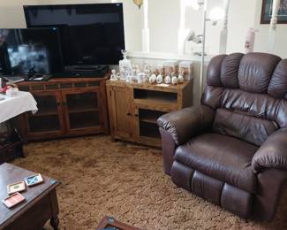 La Z Boy leather rocker recliner, tv stands, 50” Sony Bravia TV, 40” Samsung TV, Bose soundbar, cabinet, corner cabinet, Precious Moments, Hummel Eggs